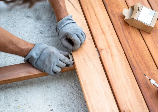 Wood deck board installation for custom backyard patio project