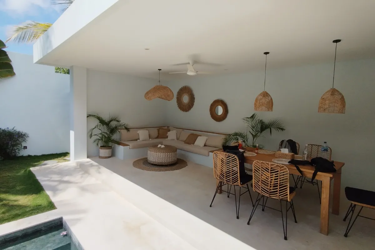 Outdoor living space design in Los Angeles with pergola seating area, landscaped garden, and modern backyard layout