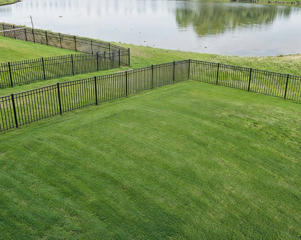 Backyard before outdoor kitchen installation in Los Angeles with empty wall and minimal landscaping