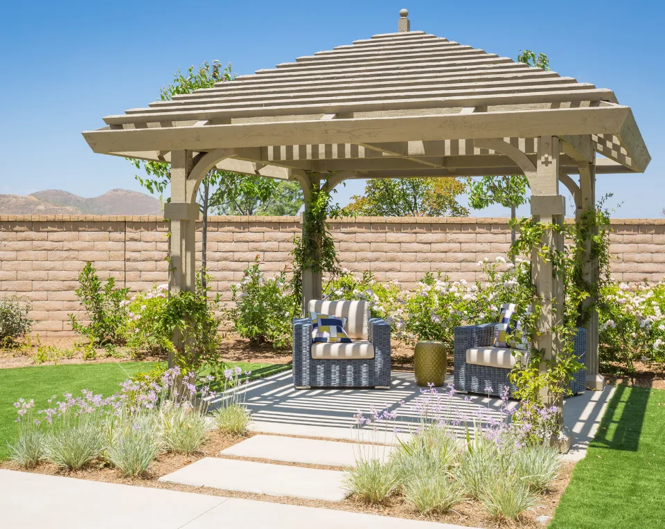 Pergola installation in Los Angeles creating shaded outdoor seating area with wood structure and landscaping